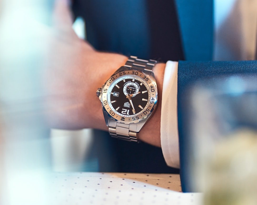 Modern women's wristwatch with diamond accents and mother-of-pearl dial